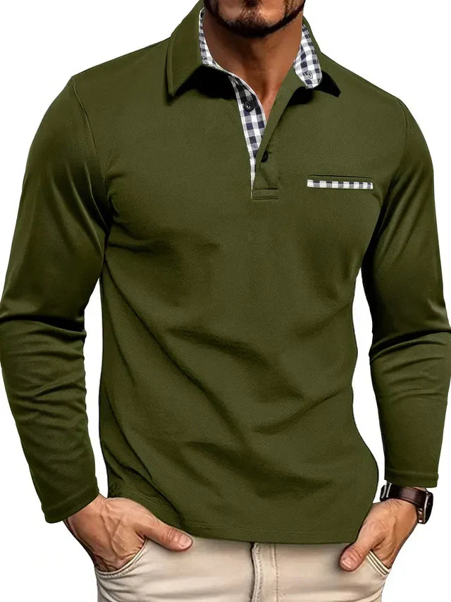 Model wearing the olive green version, with gingham collar lining, checked pocket edge and long sleeves, hands in beige trousers. 4