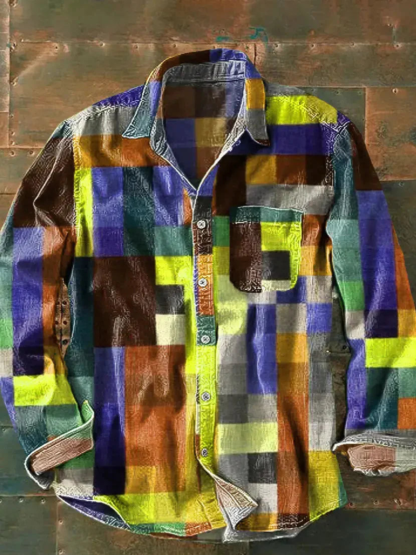 Flat lay of the shirt in a bright lime, purple, brown and teal block pattern, long sleeves with turned-back cuffs. 4