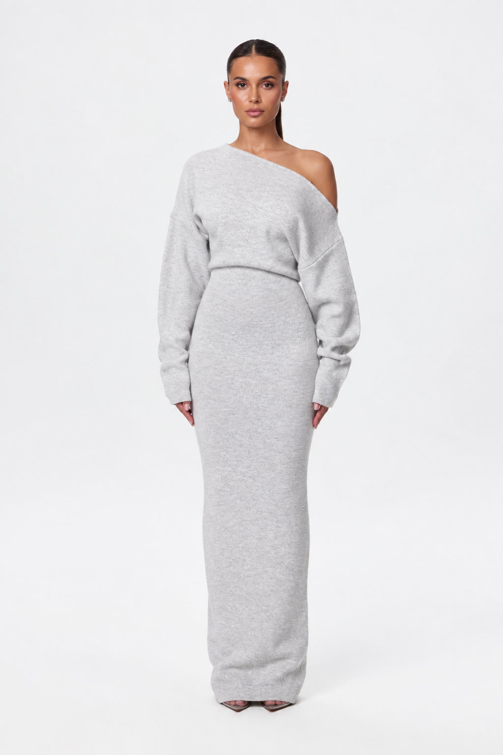 Model facing the camera in the light grey marl off-the-shoulder knit maxi dress with long sleeves. 9