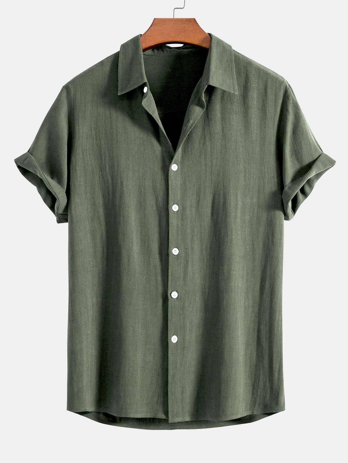 Olive green short-sleeved shirt on a wooden hanger, front view with white buttons and rolled sleeve cuffs. 5