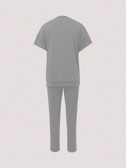 Women's 2 Pieces Casual Outfit, Comfortable Solid Color Short Sleeve Top Paired With Elastic Waist Pocket Pants, Soft Polyester-Spandex Fabric, Spring/Summer Elegant