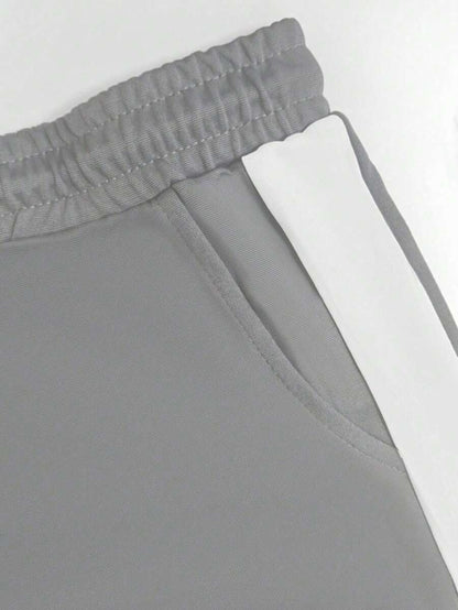 Spring/Summer Women's Casual Matching Contrast Color Round Neck Short Sleeve Top And High Waist Drawstring Straight Leg Pants 2 Pieces Set Elegant