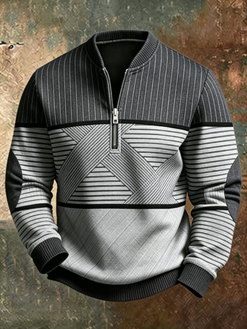 Charcoal and light grey version of the half-zip jumper with striped yoke, geometric stripe panel and dark ribbed trims. 2