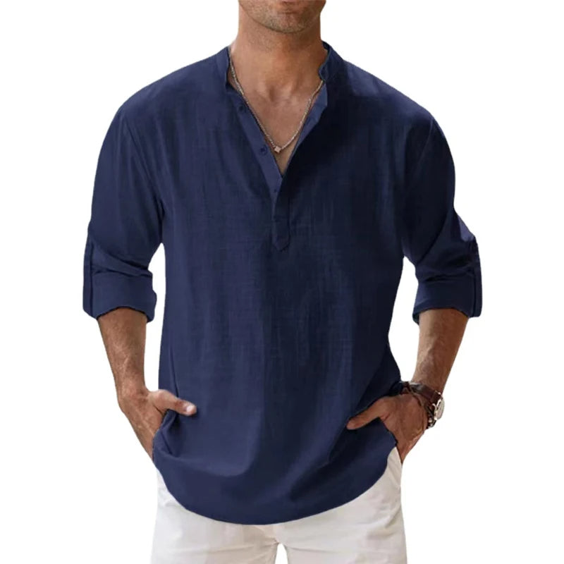 Model wearing the navy blue Henley shirt with a stand collar, button neck and rolled sleeves. 5