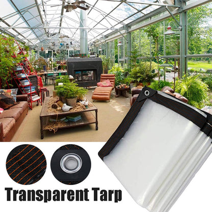 Corner of the clear tarpaulin with black woven border and metal eyelet in front of a bright conservatory-style room full of plants. 2