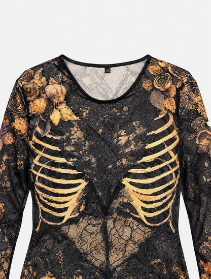 Close-up flat lay of the bodice front, showing the round neckline, sheer black lace, printed golden ribs and rose-covered shoulders. 7