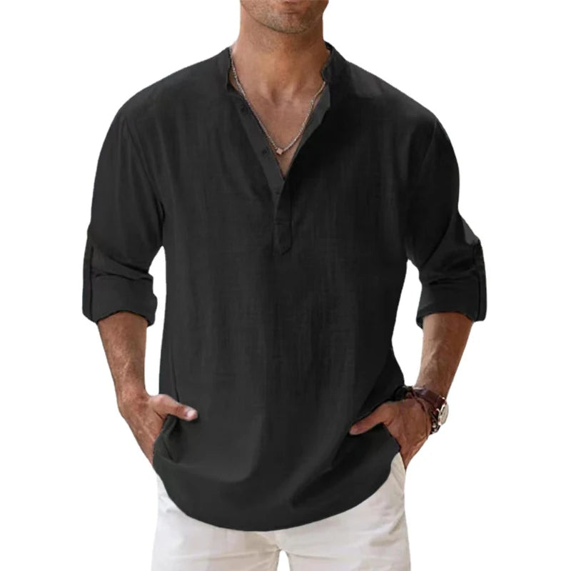Model wearing the black Henley shirt with a stand collar, short placket and sleeves rolled to the forearm. 7