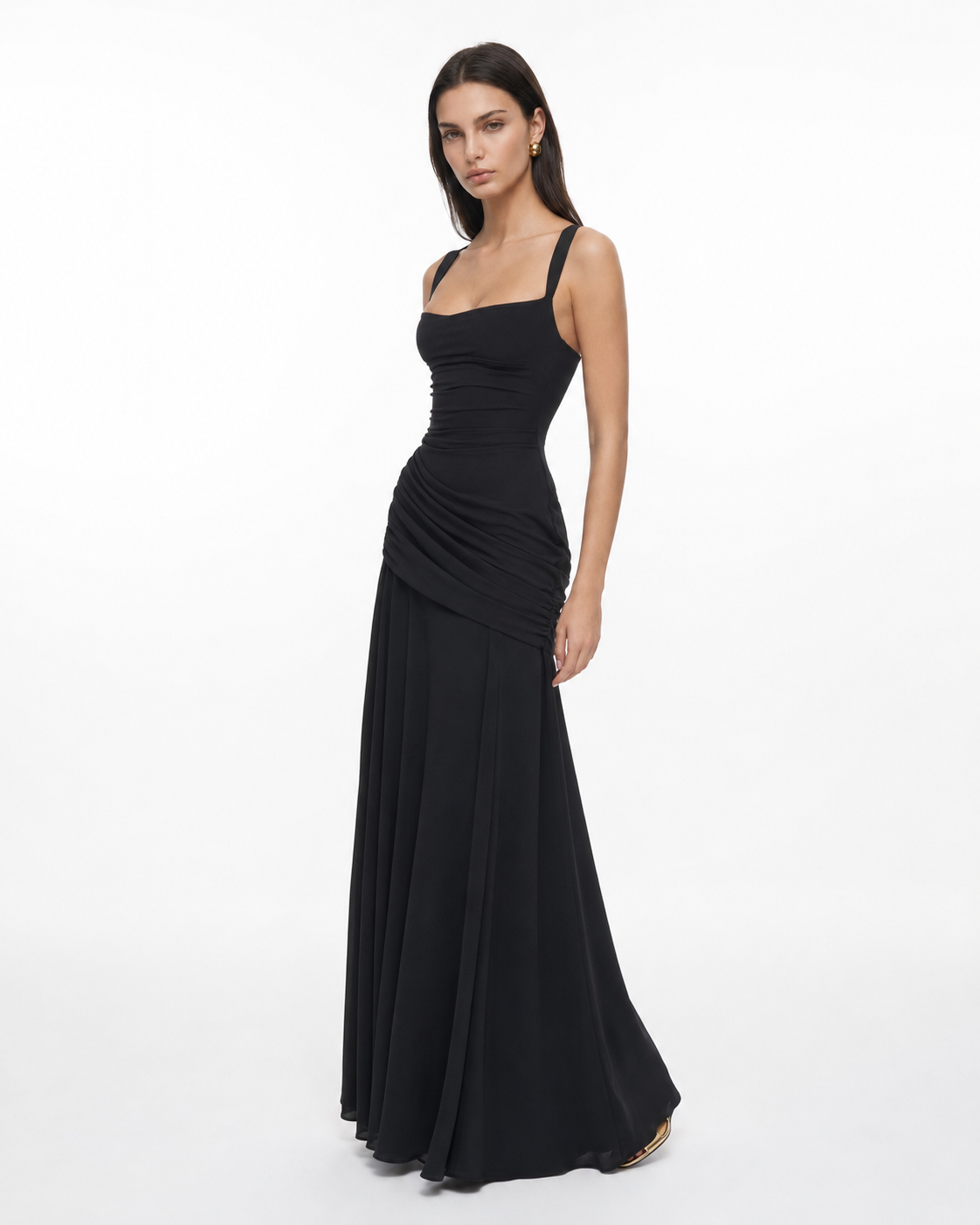 Black dress in three-quarter view, showing the wide straps, square neckline and diagonal side draping. 13
