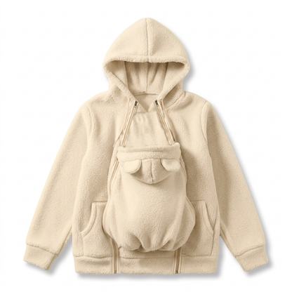Flat lay of the cream fleece hoodie with the front baby pouch, bear ears and zips at both sides. 4