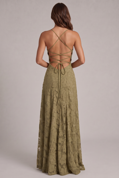 Back view of the olive green maxi dress, showing the criss-cross lace-up open back, tie closure and zip. 15