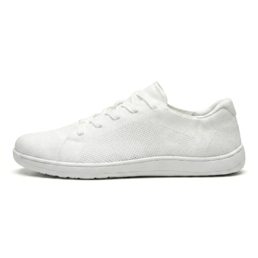 All-white knit trainer with white sole, side profile showing the mesh panel and white laces. 37
