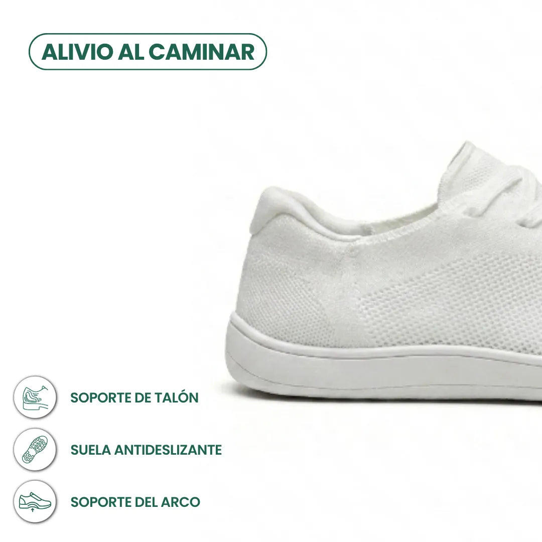 Close-up of the heel and side of a white knit trainer with white sole, with small feature icons beneath. 40