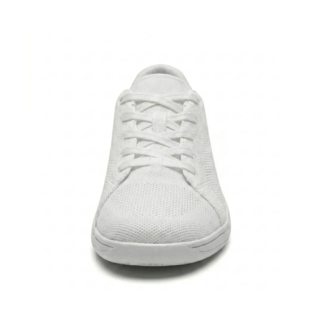 Front view of a white mesh trainer showing the broad rounded toe, criss-cross laces and flat sole. 44