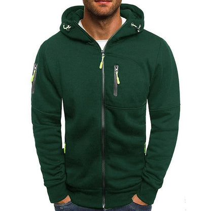 Front view of the dark green zip-up hoodie on a model, with lime green zip pulls and drawstring ends. 2
