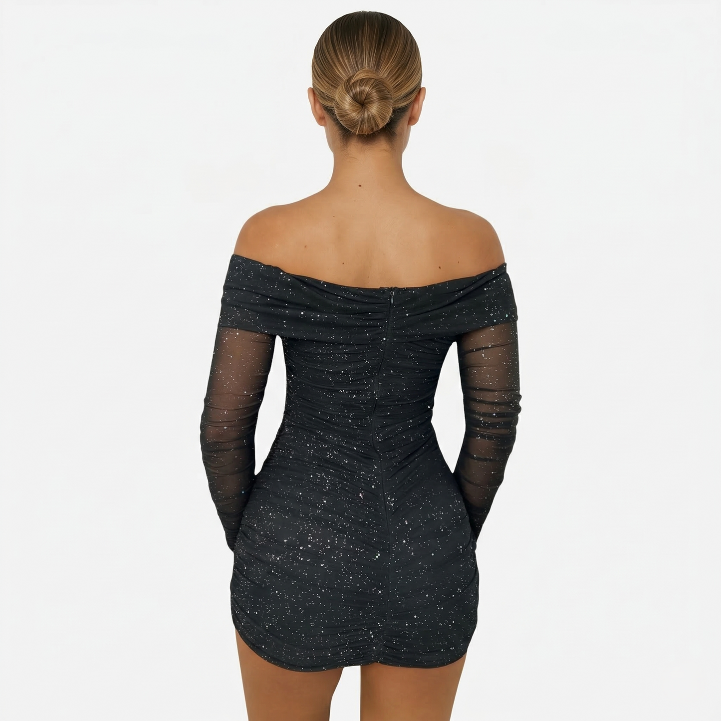 Women's off shoulder mini dress with sheer long sleeves and subtle sparkle finish, fitted silhouette in black for evening wear