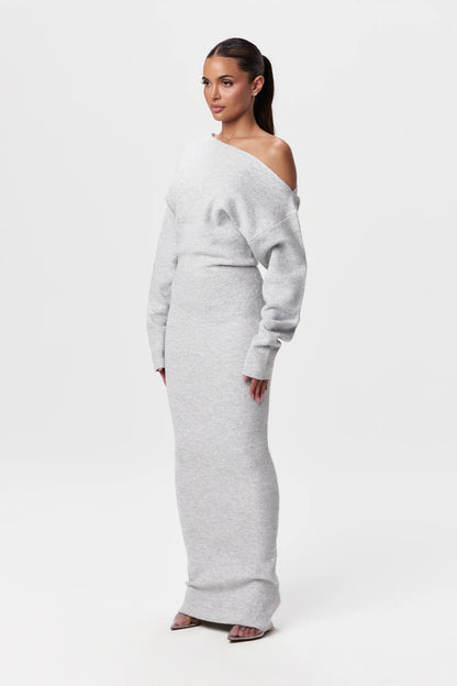 Three-quarter view of the light grey knit maxi dress, showing the soft texture and sleeve shape. 10