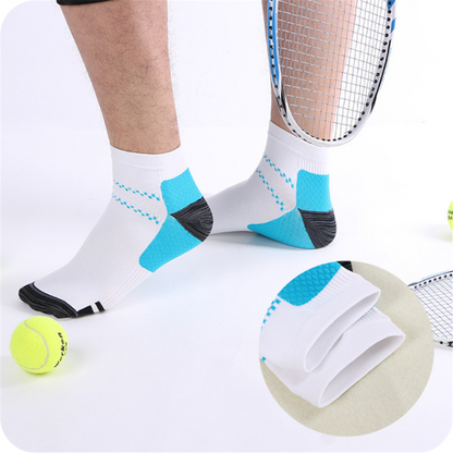Man's feet in white ankle socks with blue heel panels, tennis racket and ball nearby, inset showing the folded cuff. 3