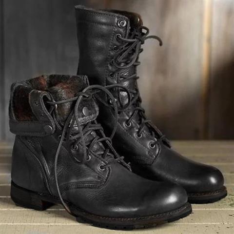 Pair of black leather lace-up boots, one with its patterned lined cuff folded down, shown from the front and side. 2