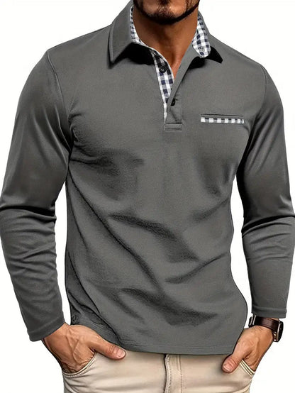 Model wearing the grey version, showing the gingham-lined collar, two-button placket and checked chest pocket trim, with beige trousers. 2