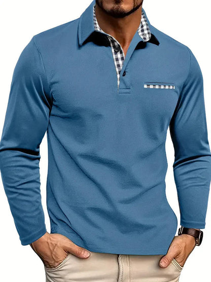 Model wearing the blue version, with checked inner collar and placket, a trimmed chest pocket and a brown leather watch. 3