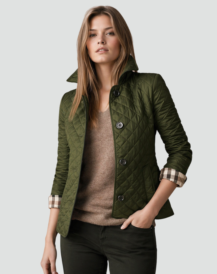 Model wearing the olive green quilted jacket with a turned-up collar over a brown knit jumper and dark trousers, check cuffs visible. 9