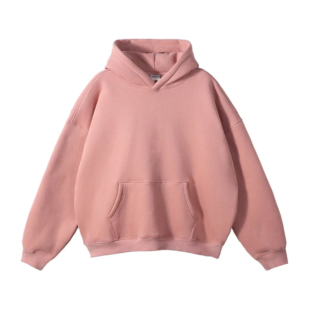 Front view of a dusty pink fleece pullover hoodie laid flat, showing the drop shoulders, ribbed cuffs and hem, and large front pocket. 10