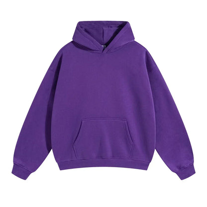 Front flat view of a plain purple pullover hoodie with drop shoulders, ribbed cuffs and hem, and a large front pocket. 12