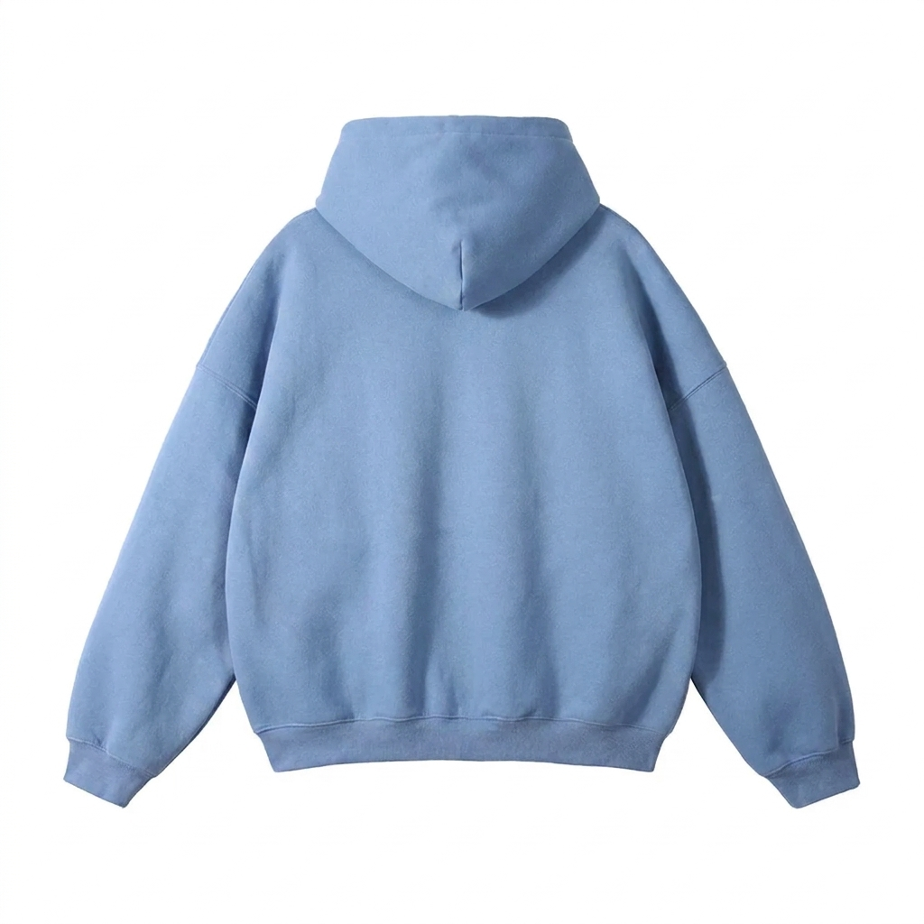Back view of a light blue hoodie laid flat, showing the plain back, hood, dropped shoulders and ribbed cuffs and hem. 3