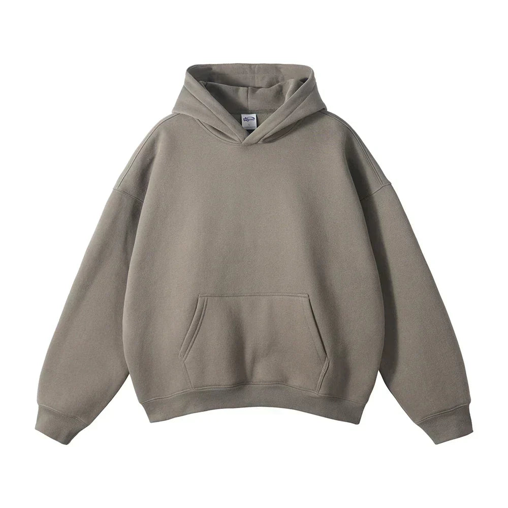 Front view of a taupe-grey pullover hoodie laid flat, showing the hood, ribbed cuffs and hem, and large front pocket. 6