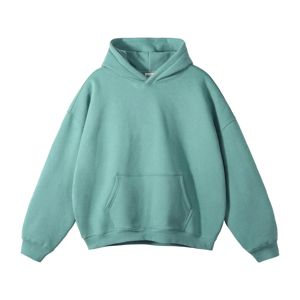 Front view of a plain teal-green hoodie laid flat, showing the hood, drop shoulders, ribbed cuffs and large front pouch pocket. 7