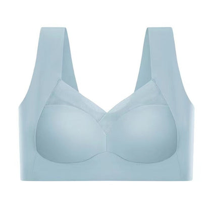 Pale blue seamless bra laid flat against a white background, showing the mesh neckline panel, wide straps and smooth cups. 10
