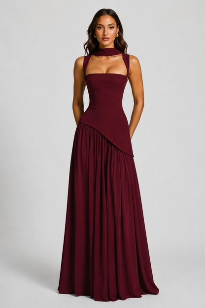 Burgundy wine-red version from the front, with the scarf worn at the neck, hands behind the back and the skirt falling in soft gathers. 8