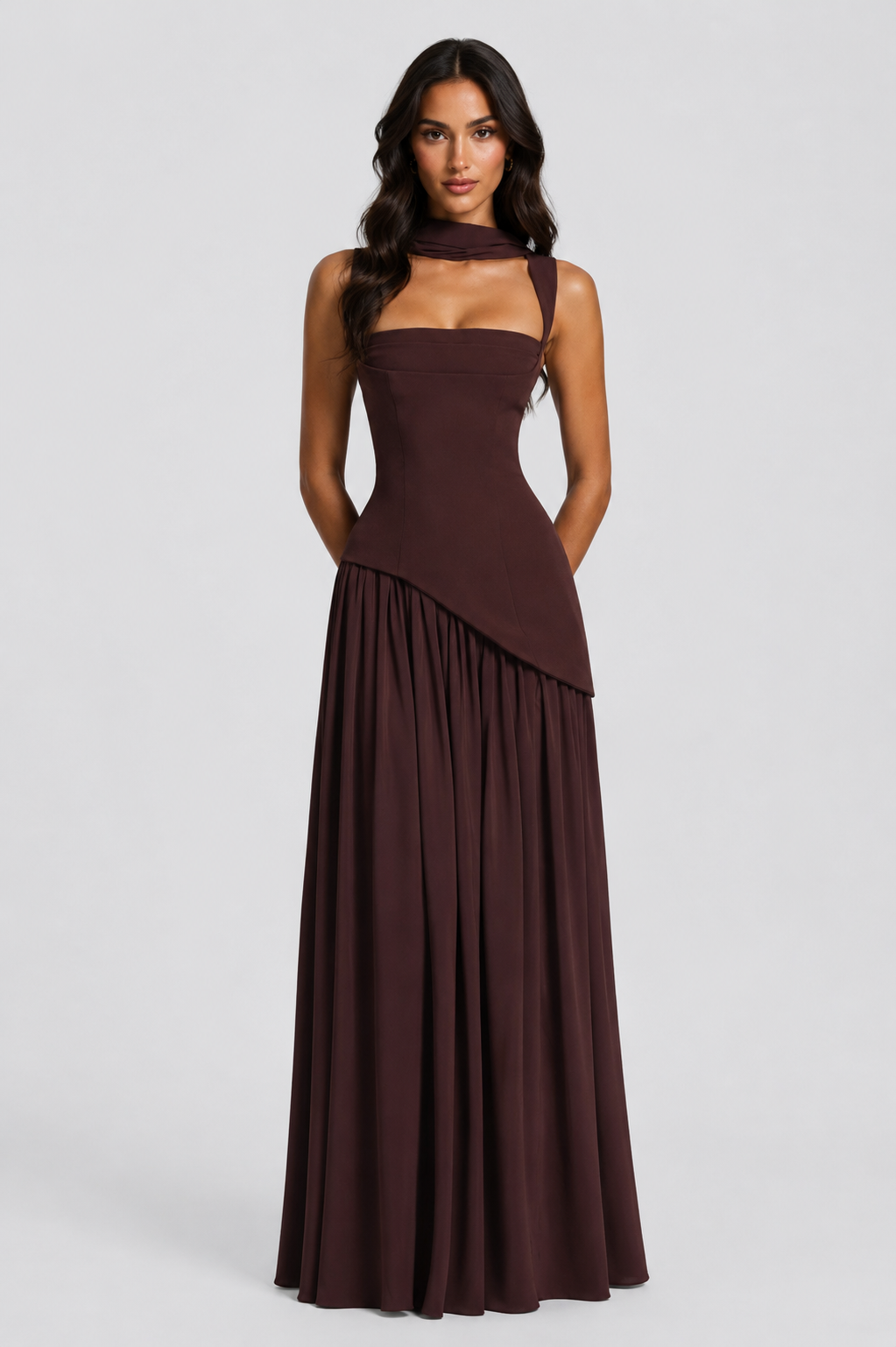 Front view in deep brown with the slit hidden, hands clasped behind the back, showing the sculpted bodice and full gathered skirt. 4