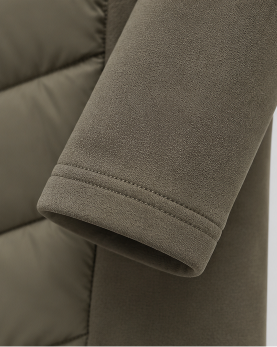 Close-up of the stretch sleeve cuff in khaki green, with a neat double row of stitching at the hem. 5