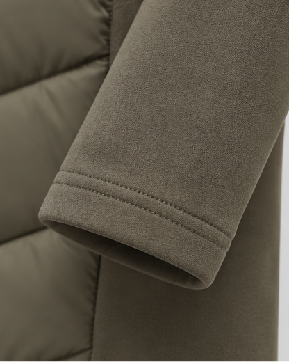 Close-up of the stretch sleeve cuff in khaki green, with a neat double row of stitching at the hem. 5
