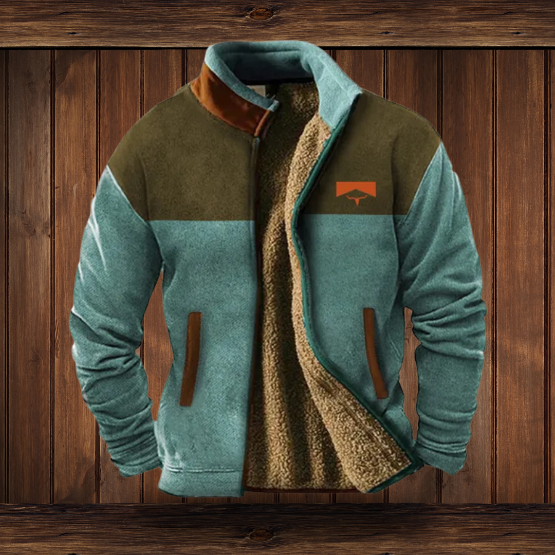 Colour-block fleece jacket with olive shoulders and teal body and sleeves, open to show the plush lining, with an orange chest patch. 6