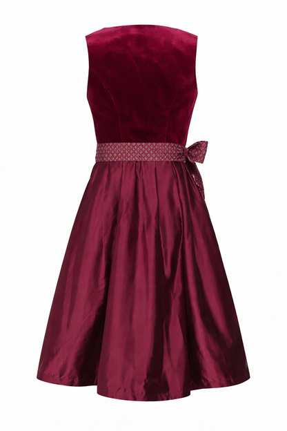 Back view of the dress with the patterned apron waistband tied in a bow at the back. 5