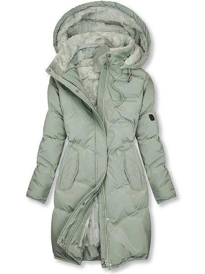 Front view of the same padded coat in pale sage green, with a light grey fleece lining visible at the open zip. 2