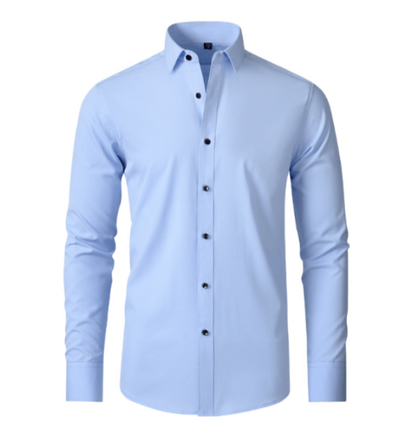 Light blue long-sleeved shirt with a pointed collar and dark buttons, displayed from the front on a white background. 8