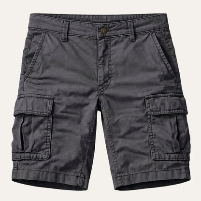 Dark grey version laid flat from the front, showing the button waistband, slanted front pockets and two flap cargo pockets. 3