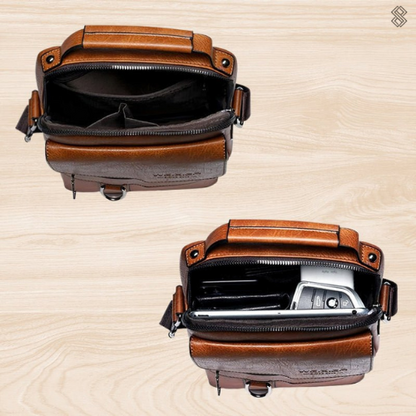 Top-down view of the open main compartment, empty above and below holding a phone, car key and small items. 10