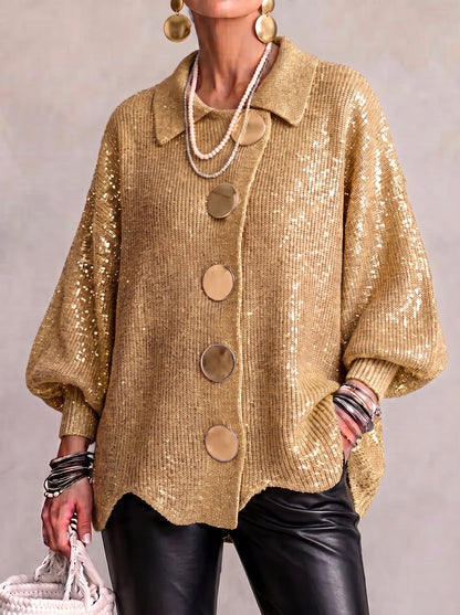 Front view of the gold sequinned knit version worn with black leather trousers, with large metal buttons and a collar. 5