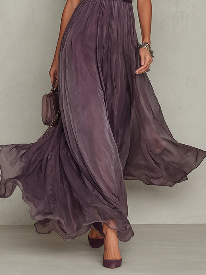 Close-up of the sheer, flowing purple skirt in motion, showing the soft draping and delicate hem from the waist down. 5