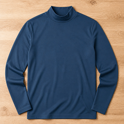 Navy blue version of the long sleeve high-neck tee laid flat on a wooden floor. 12